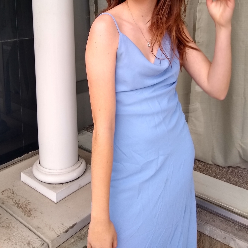 A blue cocktail dress. Elegant and simple.
